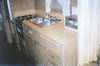 The kitchen has plenty of cupboard space, 4 burner stove, oven and sink.  A new hot water tank was installed this summer.